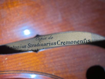 null 355 mm violin and study bow probably made in Mirecourt. 
Early 20th century....
