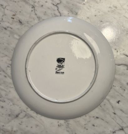 null FORNASETTI MILANO porcelain plate. 
Diameter: 26 cm.