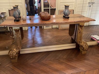 null Rectangular console table in carved and gilded wood. The top is painted in trompe-l'oeil...