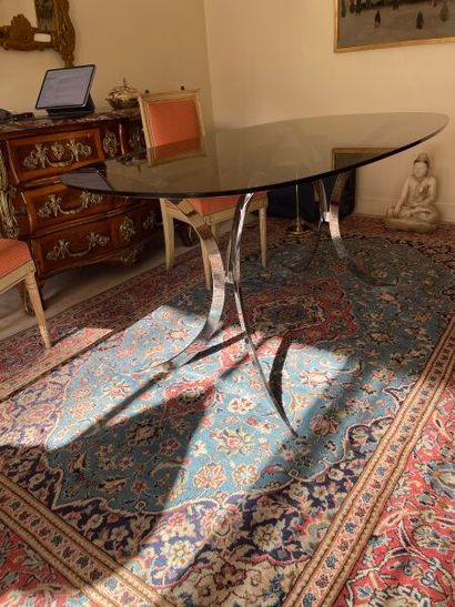 null In the taste of Osvaldo Borsani
Design dining table, chrome-plated metal base...