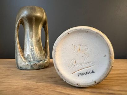 null DENBAC France, model 175.
Pair of small ceramic vases with khaki glaze and cream...