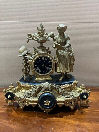 null Gilded regule and black marble clock from Belgium with romantic decoration of...