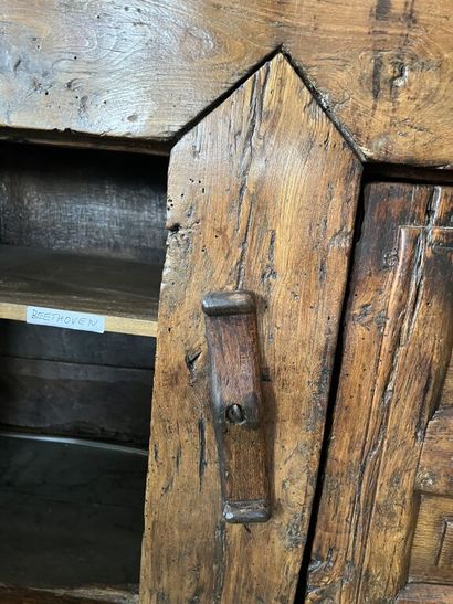 null Natural wood rustic cabinet with four doors. 
Spanish work of the 17th century....