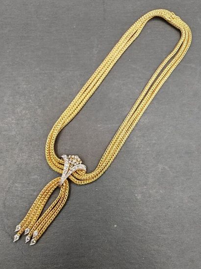 null Necklace in 750 mm gold and 950 mm platinum, a V-shaped motif set with brilliant-cut...