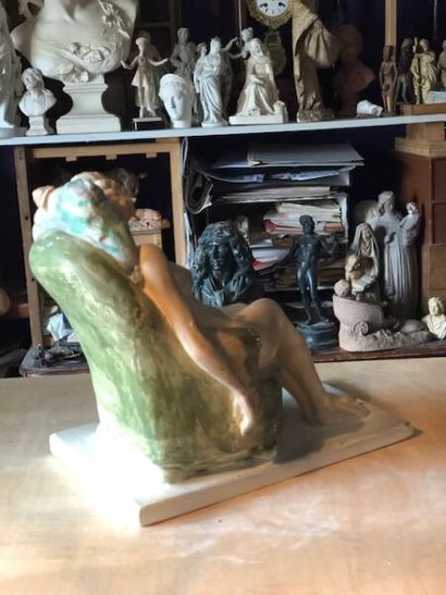 null 20th century French school. 
Nude woman kneeling on an armchair.
Group in patinated...
