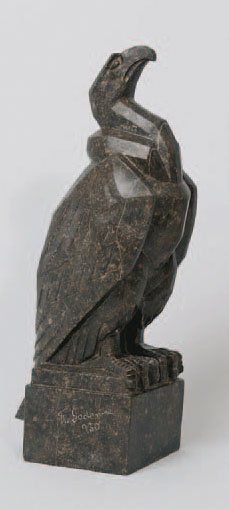 E. GADENNE. Sculpture en marbre gris en taille directe d'un vautour stylisé. Hauteur...