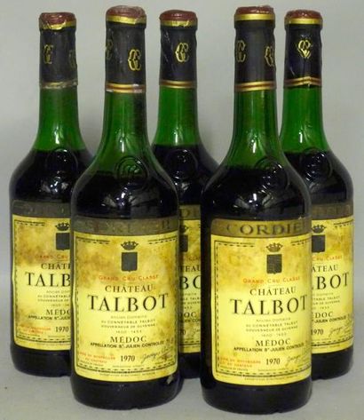  5 Bouteilles CHÂTEAU TALBOT 1970 Étiquettes tachées; niveaux bas. Labels stained,...