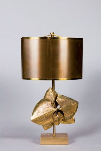 CHRYSTIANE CHARLES Modèle ORCHIDÉE. Lampe en bronze et métal doré à décor de feuillages...