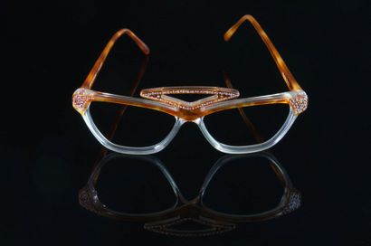 null *Pierre MARLY pour ATMOSPHERE, 

Deux montures de lunettes de type "Eventail"...