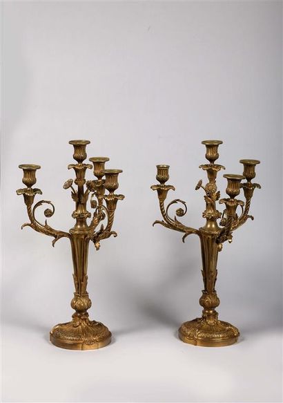 null Paire de candélabres à quatre bras de lumière en bronze doré.
Style Louis XVI,...
