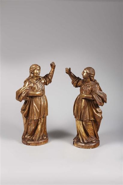 null Deux orants formant pendant en bois sculpté et argenté, représentés debouts,...