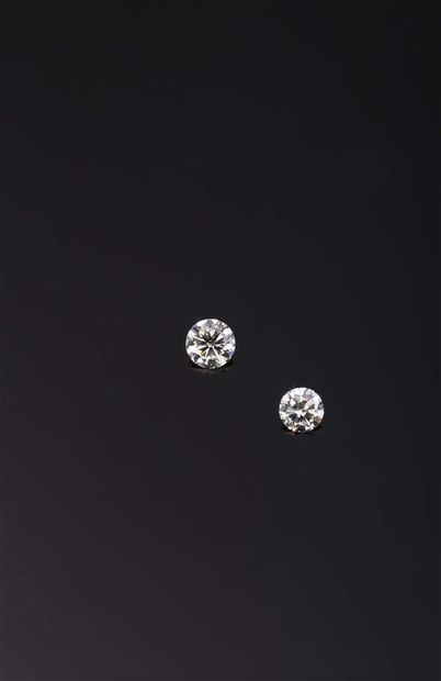  Bague solitaire ornée d'un diamant pesant 3,17 cts. Poids brut : 2,65 g. Certificat...