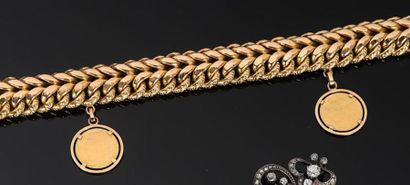 null Bracelet en or portant deux breloques, l'une pièce de 10 frs Napoléon, l'autre...