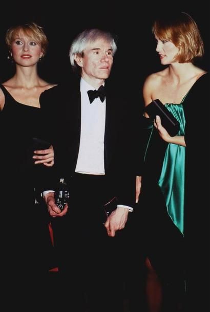 ANDY WARHOL WITH TWO MODELS.
By Rose Hartman.
Metropolitan...