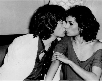 MICK & BIANCA JAGGER KISSING. By Rose Hartman....