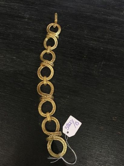 null Bracelet en or à mailles plates et motifs de noeuds, poids : 53,7 g.
