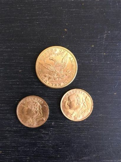null Lot de pièces d'or comprenant : 
- 2 x 20 Frs suisses 
- 1 x 10 dollars américains.
Poids...