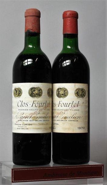null 2 bouteilles CLOS FOURTET - St. Emilion Grand cru, 1970.
Étiquettes légèrement...