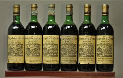 null 6 bouteilles CHAPELLE DE LA TRINITÉ - St. Emilion Grand cru 1979.
1 étiquette...