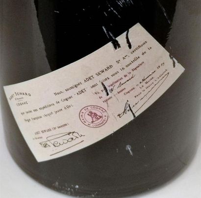null 1 bouteille COGNAC ADET SEWARD 1929. 
Certificat d'origine apposé au dos.