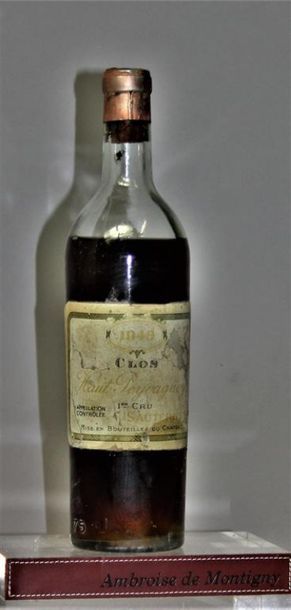null 1 bouteille CLOS HAUT PEYRAGUEY - 1er CC Sauternes 1949.
Etiquette abimée, niveau...