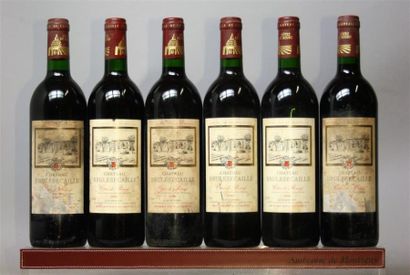 null 6 bouteilles CHÂTEAU BRULESÉCAILLE - Côtes de Bourg 1990.
3 étiquettes tachées,...