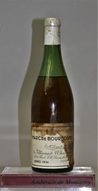 null 1 bouteille MARC DE BOURGOGNE DOMAINE DE LA ROMANÉE CONTI 1934 
Etiquette abimée,...