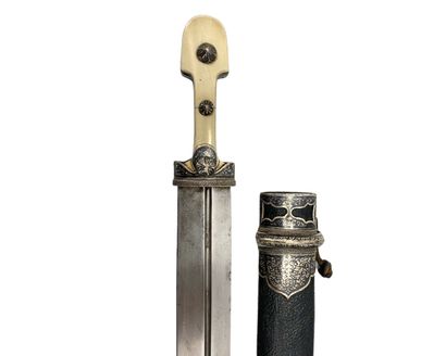 null KINDJAL WITH ITS ORIGINAL SCABBARD
The blade bears a master stamp "Osman".
Silver,...