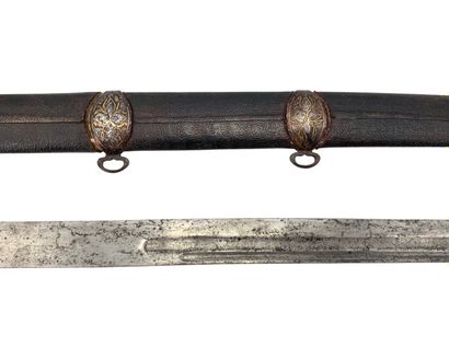 null SWORD WITH ITS SCABBARD
Steel, leather
78.5 cm; 73 cm (blade), Georgia, 19th...