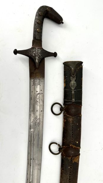 null Seif" oriental-style SABRE
The blade is decorated with a moon and sun motif....