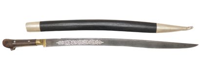 null CAUCASIAN YATAGAN 
Blade decorated with silver plate Steel, wood, silver 
71...