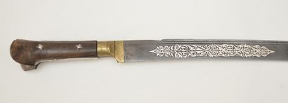 null CAUCASIAN YATAGAN 
Blade decorated with silver plate Steel, wood, silver 
71...