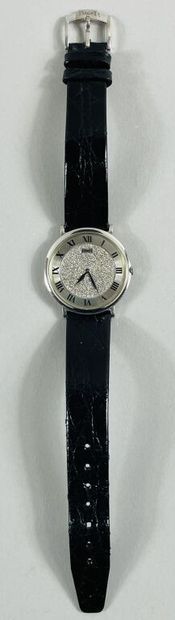 null PIAGET


Montre bracelet de dame.


Boîtier circulaire en or gris (750), cadran...