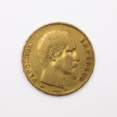 null Une pièce de 20 francs or Napoléon III "tête nue", 1855 A.
Poids : 6,4 g.
U...