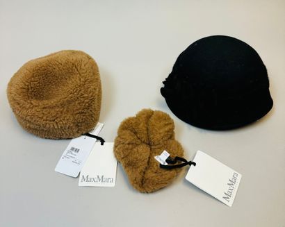 null MAXMARA
Lot including a black hat (size M) decorated with a flower, a brown...