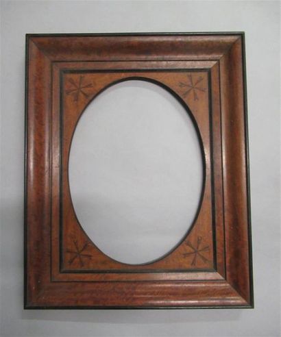 null Wooden frame moulded in oval view all inlaid with exotic wood and ebony fillets...