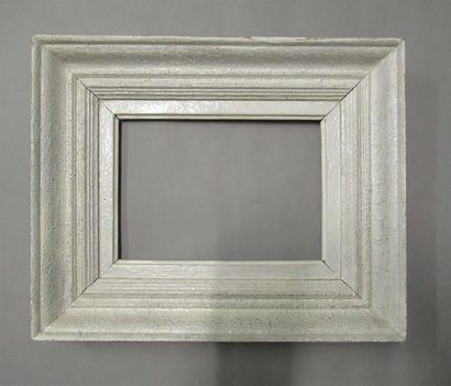null Moulded, painted and patinated wooden frame with shower profile
Circa 1950
Height:...
