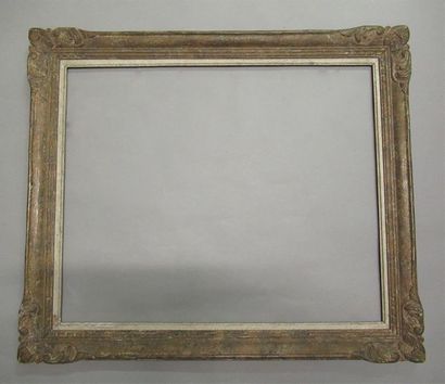 null Frame in carved, painted and patinated wood called "Montparnasse" with stylized...