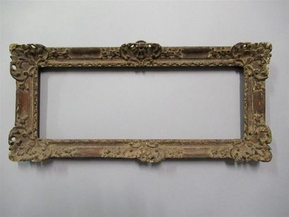null Painted and patinated carved oak frame decorated with shells, bases, flowers...