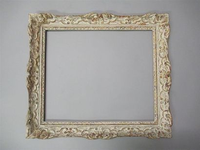null Carved, painted and patinated wood frame called "Montparnasse" with stylized...