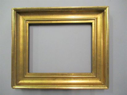 null Moulded wooden frame, gilded with copper, with rush profile and groove.
19th...