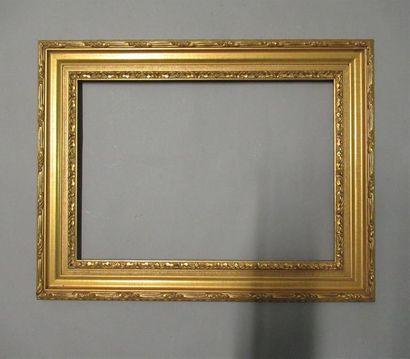 null Wooden frame with gilded resin, pastel patina, decorated with a frieze of acanthus...