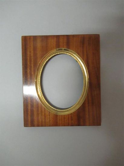 null Oval view miniature frame in monoxyl satinwood and gilded brass; interior design...