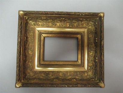 null Wooden frame and gilded stucco known as "Barbizon" decorated with pearl grapes,...