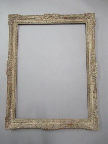 null Carved, painted and patinated wood frame called "Montparnasse" with decoration...