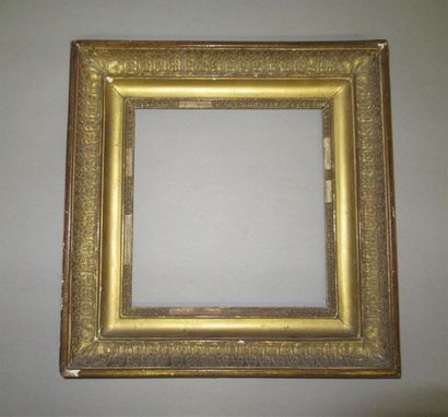 null Oak frame and gilded paste known as "double throat" with heart grape decoration,...