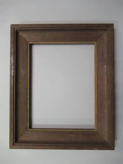 null Moulded natural oak frame, bronzed at sight with flat profile and veneered throat...