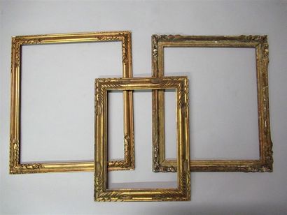 null Set of 3 carved wooden frames with stylized decoration, one bronzed, one gilded...