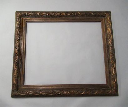 null Carved wood frame, gilded with copper and patinated with pearl grape decoration,...