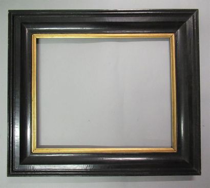 null Moulded wood frame gilded and blackened.

19th C. period.

54,5 X 67,5 cm -...